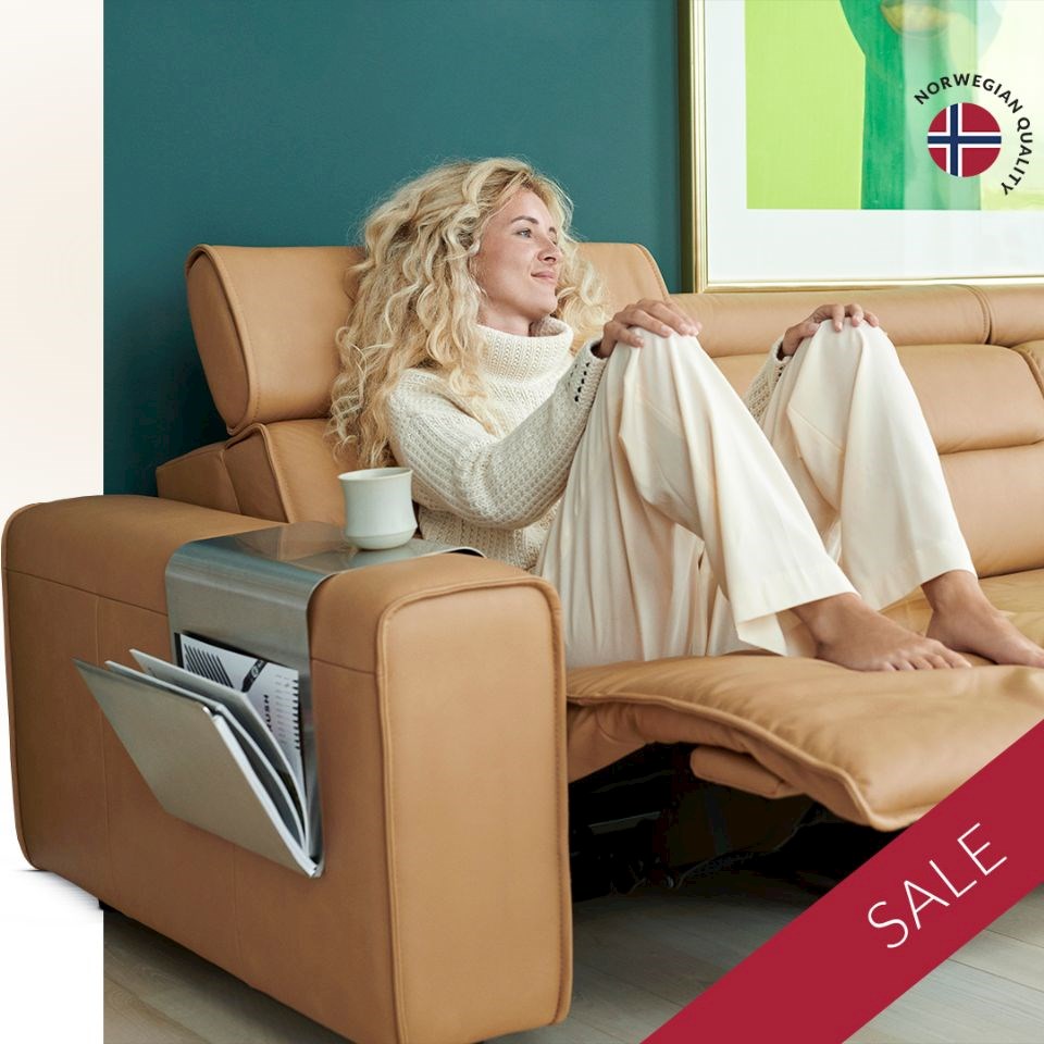 Woman seating on a Stressless Emily and sale information