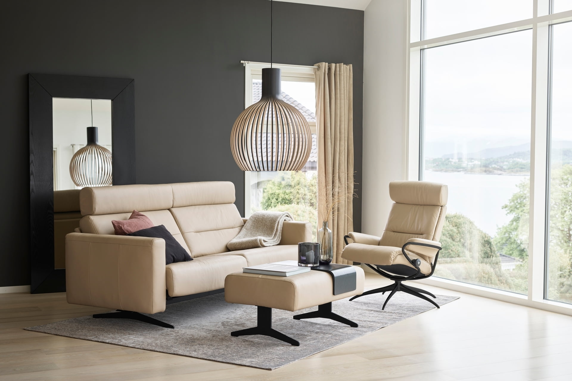 Stressless Stella 2,5+Seater with Headrest in Paloma Beige leather and Black Legs Ottoman, with Tokyo recliner Low with Headrest in Paloma Beige and Black Legs