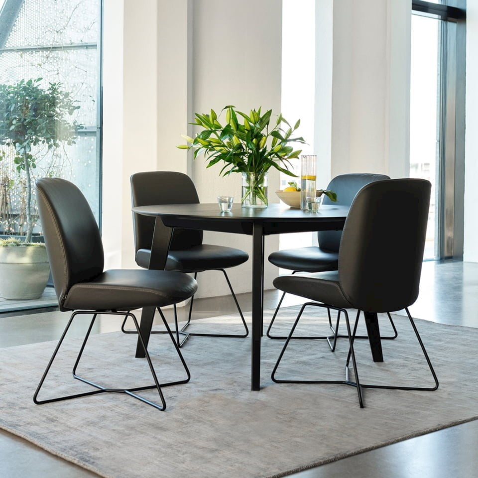 Four Stressles® Bay dining chairs around a round table