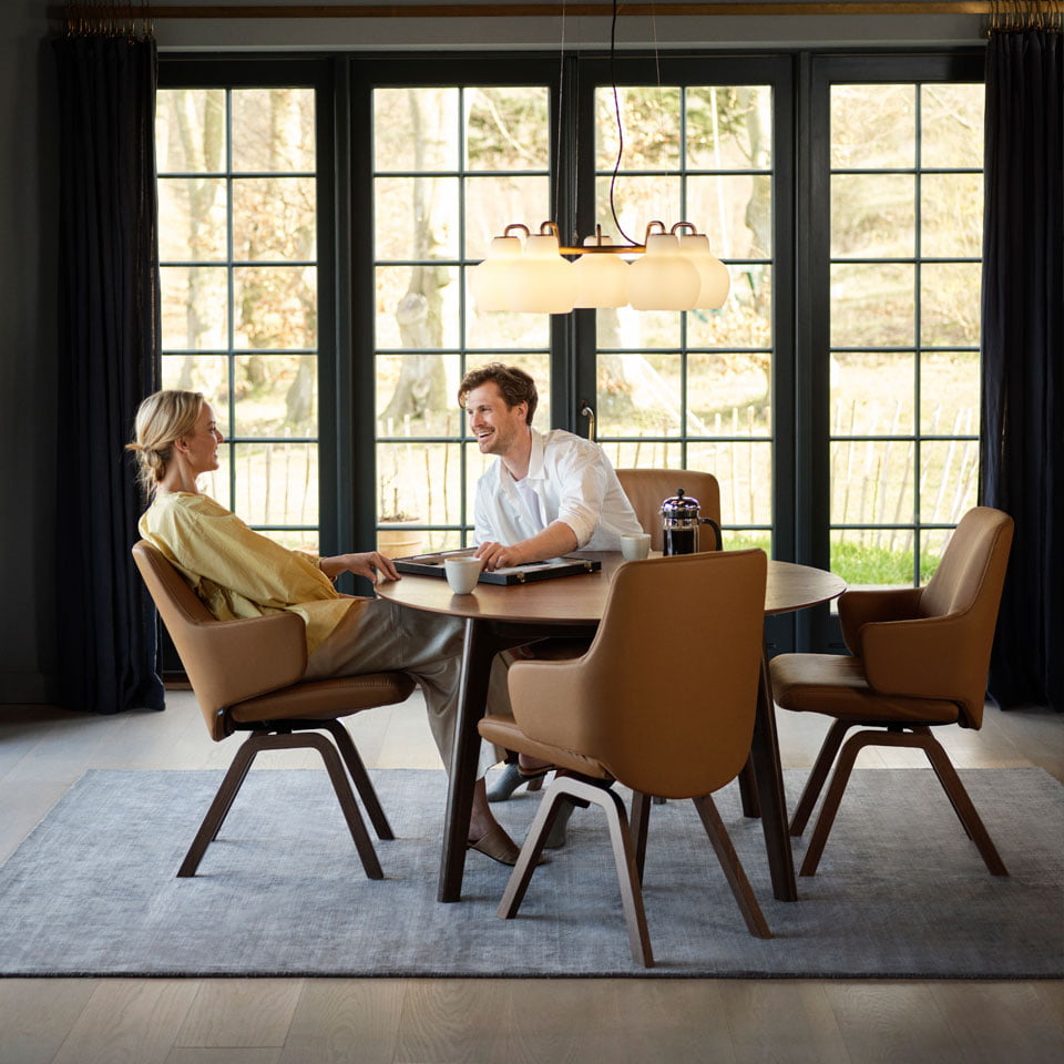 Couple sitting at Stressless Dining setup