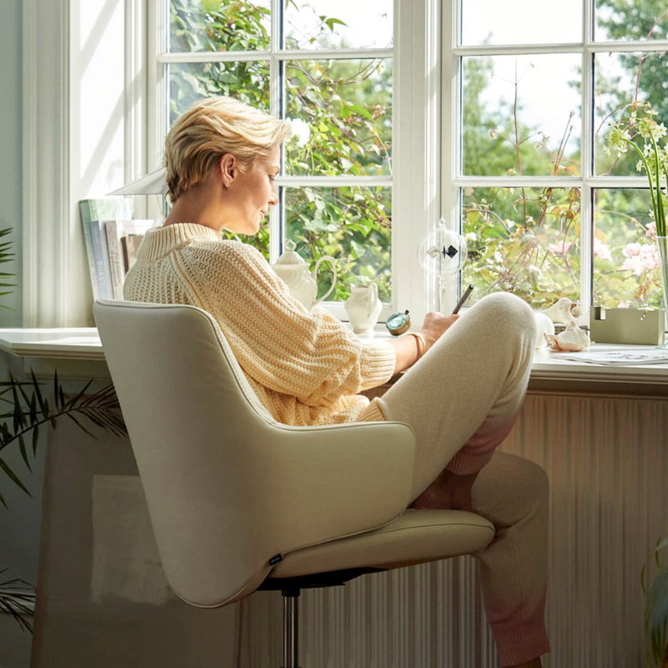 Woman in Stressless Laurel Home Office chair