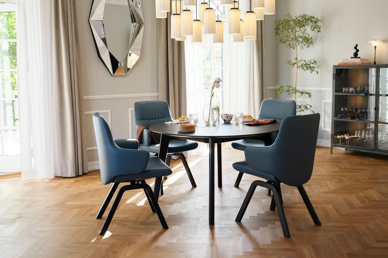 Stressless Mint dining chairs and Bordeaux round  table