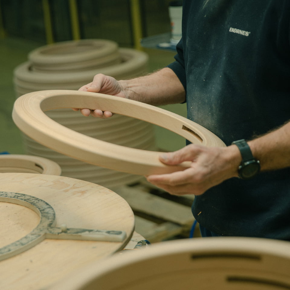 Man holding Stresless® base ring